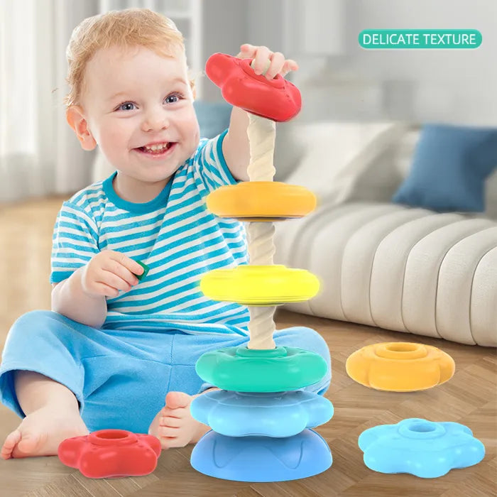 Rotating rainbow stacking tower for babies